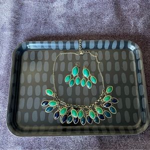 3 for $12 Francesca earring and necklace set in gold and shades of blue.